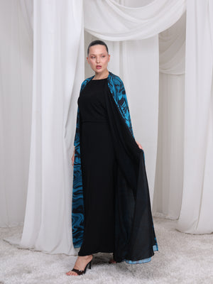 Close-up of the wave-inspired print on The Wave blue abaya