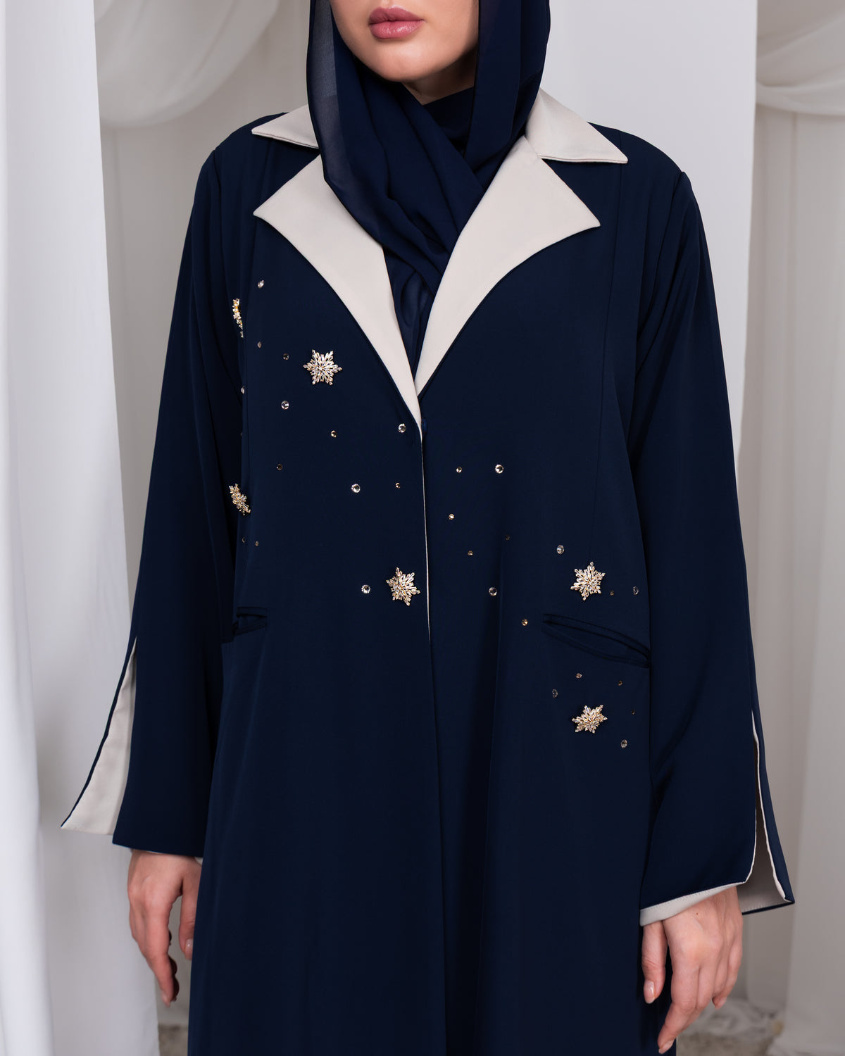 Contrasting beige tailored lapel detail on The Celestial Heir luxury abaya