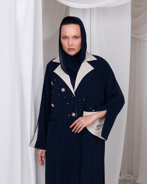Close-up of celestial-inspired hand and machine embroidery on The Celestial Heir abaya