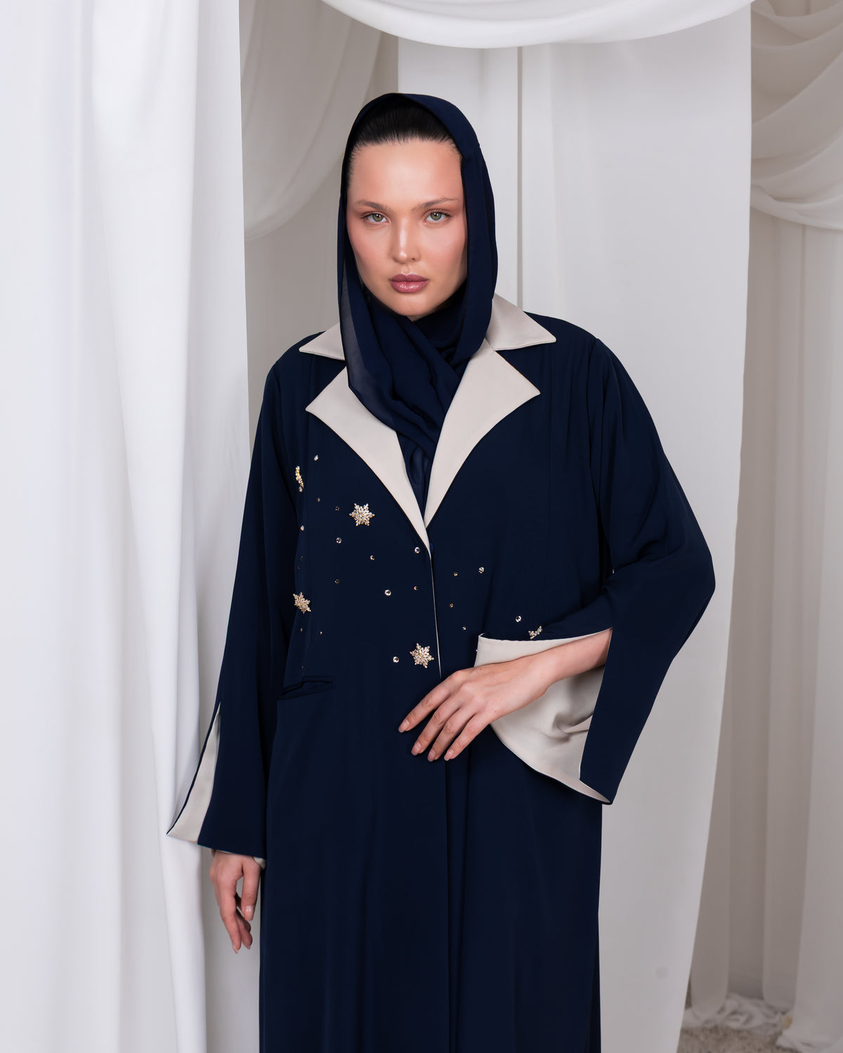 Close-up of celestial-inspired hand and machine embroidery on The Celestial Heir abaya