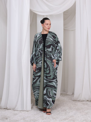 Full of the wave-inspired print on The Wave olive abaya