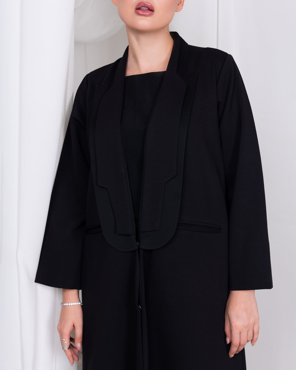 Architectural shawl collar detail on The Regent Poise luxury black abaya