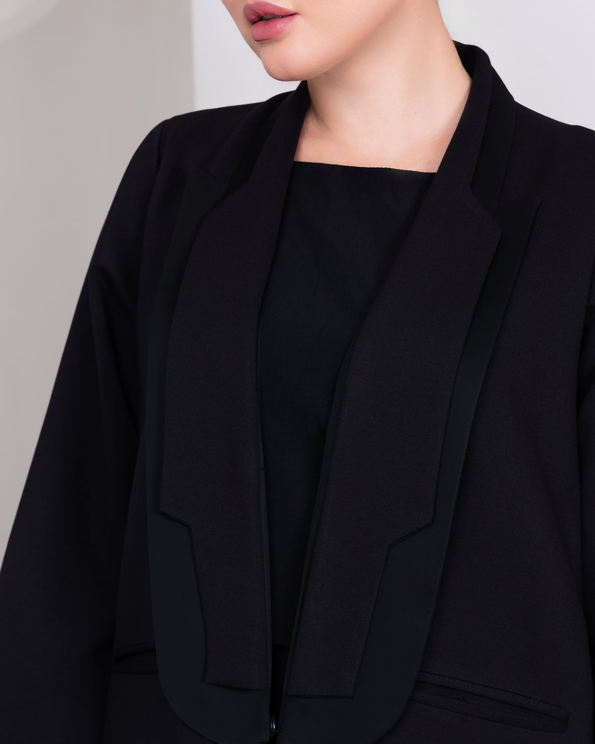 Architectural shawl collar detail on The Regent Poise luxury black abaya