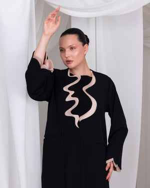 Beige cuff detail on The Sovereign Flow luxury black abaya